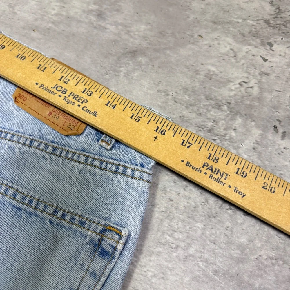 Vintage Levis 550 Relaxed Fit Tapered Light Wash Jeans Made in USA 34x32